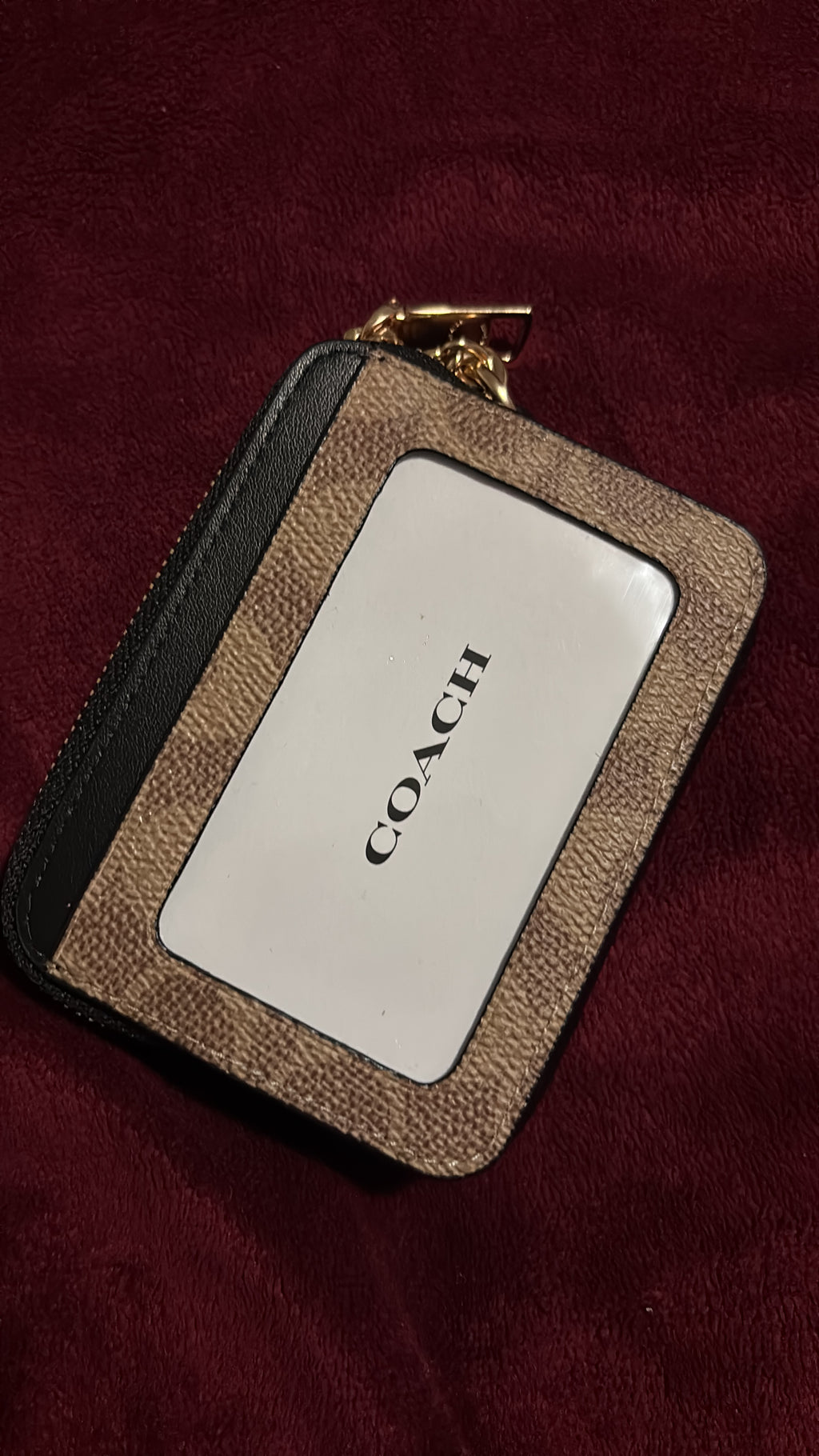 Coach Zip card case coach negra con café