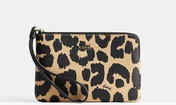 Muñequera coach leopardo