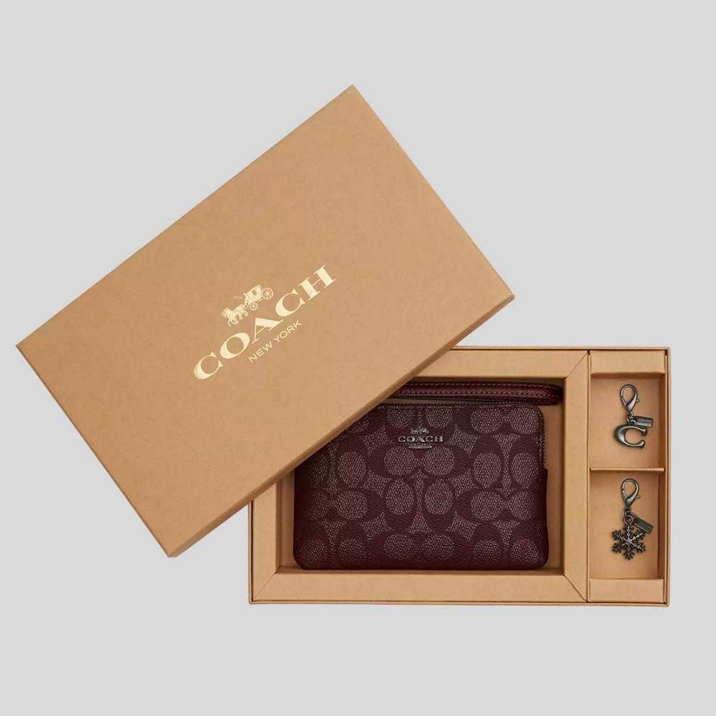 Boxed Corner Zip Wristlet in Signature Canvas with charms